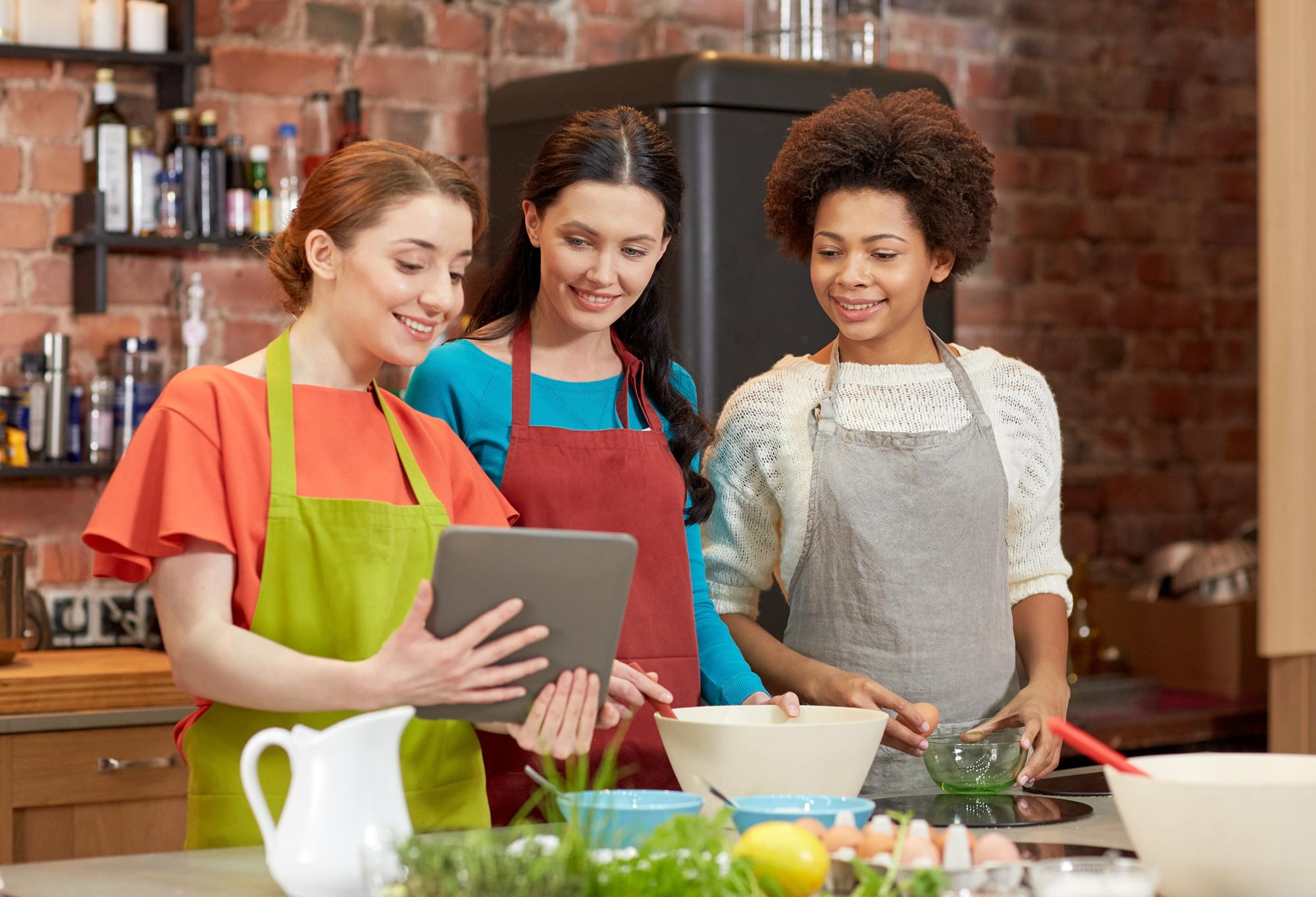 Small group tasting in a bright kitchen