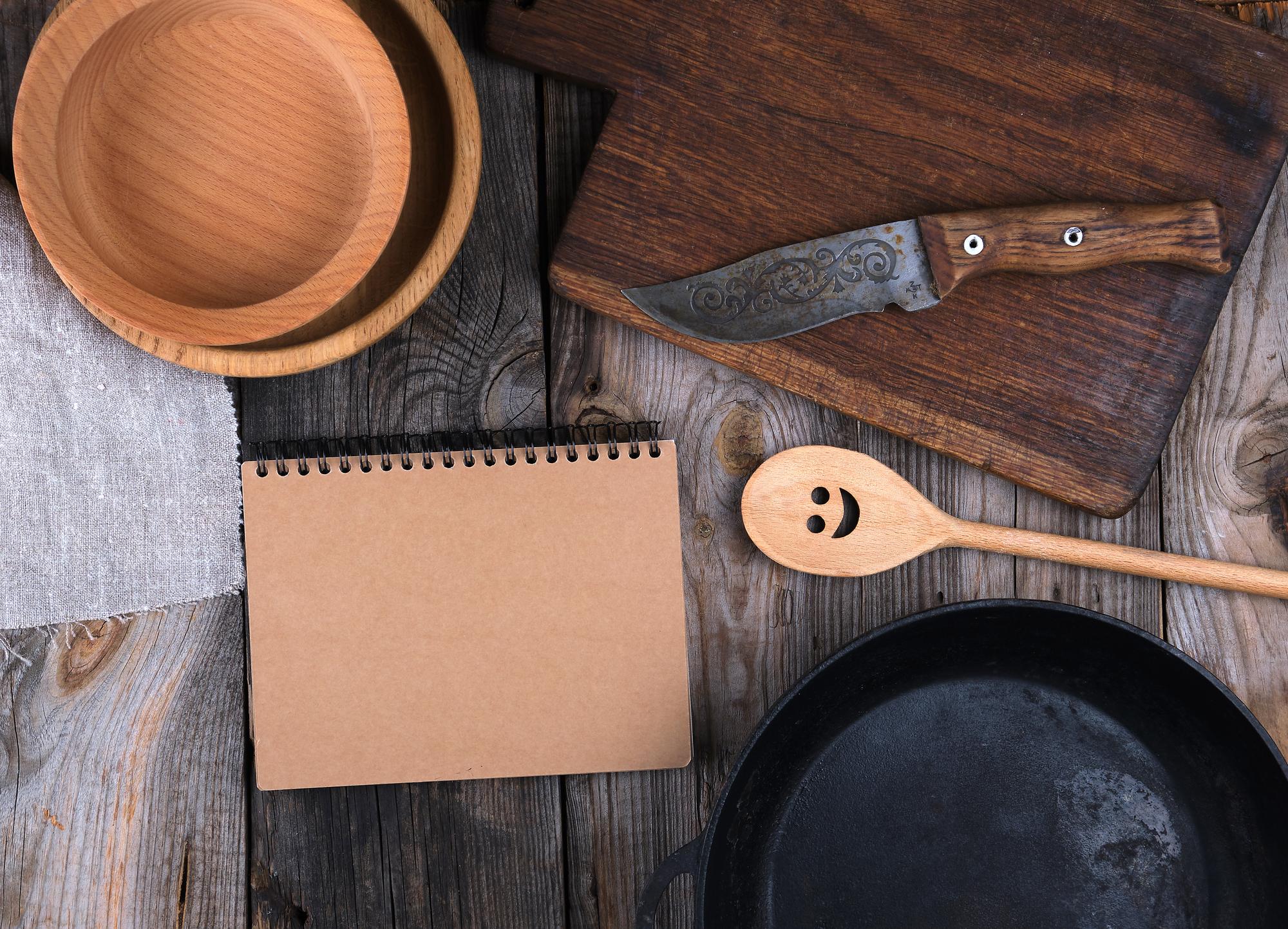 Flat lay of recipe cards and utensils